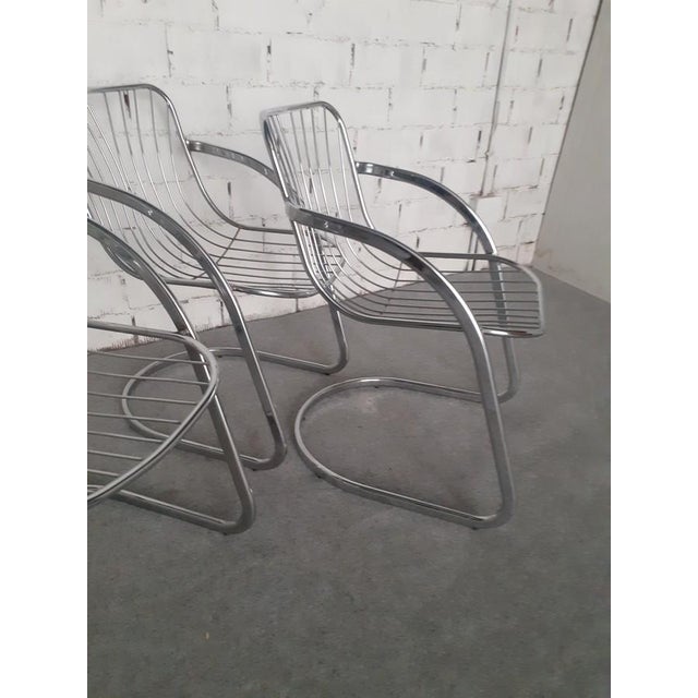 4 chairs from the 70s, structure with chrome plating without defects. This piece is attributed to the mentioned...