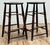Early 20th C English style four legged stool with carved stretchers for support. Beautiful turned legs and natural patina...