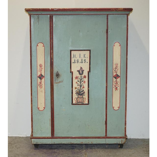 Stunning original 1818 dated Antique German Marriage wardrobe in very a rare light blue paint I have recently purchased a...