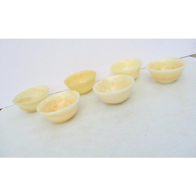 Vintage 1990s alabaster banded finger bowls or decorative tabletop votives. Amber golden stone with off-white to darker...