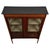 An elegant early 20th-century English display cabinet, finely crafted from mahogany and distinguished by its delicate...