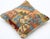 A one-of-a-kind handwoven Afghan wool kilim accent pillow featuring geometric patchwork. Cut and sewn by hand from a flat-...