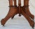 Burled walnut makes this Eastlake table a standout. It is Victorian from the late 19th century. The heavily carved wood it...