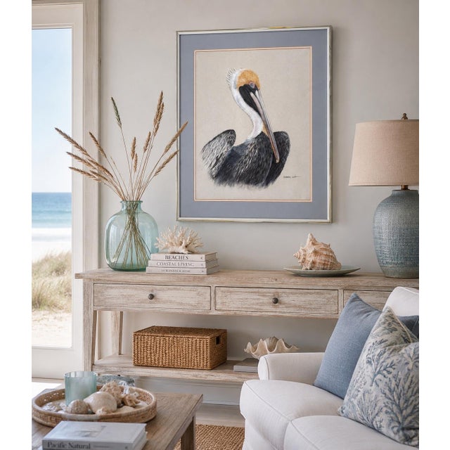 A charming large-scale original pastel drawing depicting a majestic brown pelican, signed by artist Dolores Witt. Rendered...
