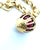 Fabergé, 18k Yellow Gold and Enamel Egg Charm Bracelet For Sale In Chicago - Image 6 of 7