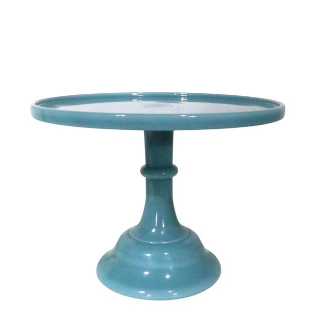 Two glass cake stands by Mosser, one Jadite, one Georgia Blue. Both are in mint condition, free of damage or repairs,...