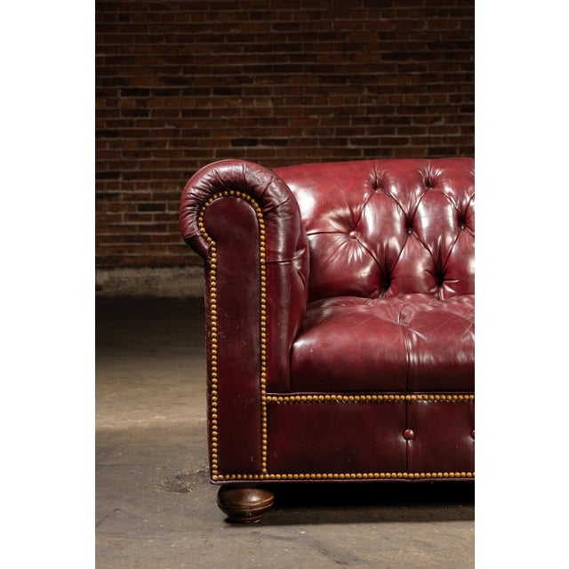Vintage Deep Red Leather Tufted Chesterfield Sofa With Brass Nailhead Trim For Sale - Image 9 of 9