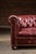 Vintage Deep Red Leather Tufted Chesterfield Sofa With Brass Nailhead Trim For Sale - Image 9 of 9