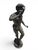 Charming and highly decorative bronze sculpture depicting a young boy blowing a horn while standing upon a sculptural...