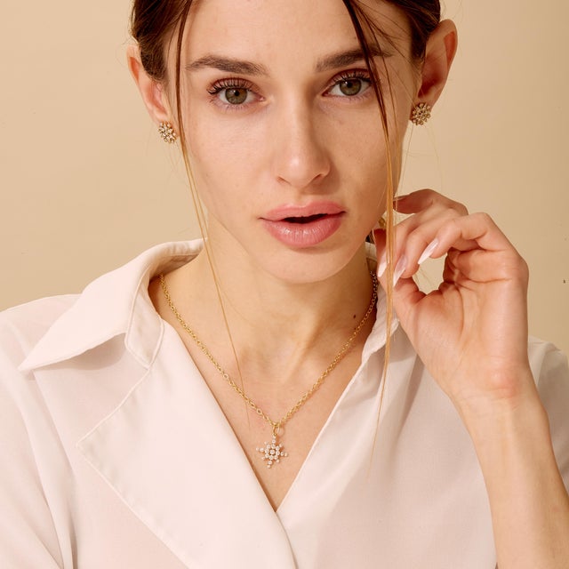 Created in 18 karat yellow gold Diamonds 0.75 carat approx. Chain sold separately Stunningly fashioned in 18K yellow gold,...