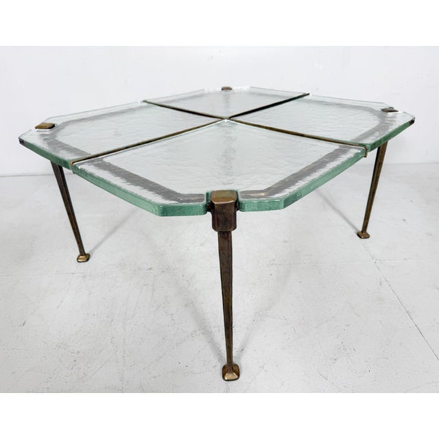 Brutalist side table/coffee table from the 1980s, germany, solid construction in hand-forged bronze with 4 cast lead...