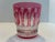 An exceptional set of 15 Saint-Louis crystal old-fashioned glasses in the iconic Tommy pattern, presented in a rich ruby-...