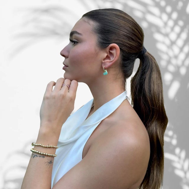 Green Enamel Heart Diamond Hoop Gold Earrings strikes a perfect balance between modern chic and timeless elegance. The...