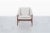 Mid-century modern walnut armchair attributed to Folke Ohlsson for DUX, manufactured in Sweden during the 1950s. A...