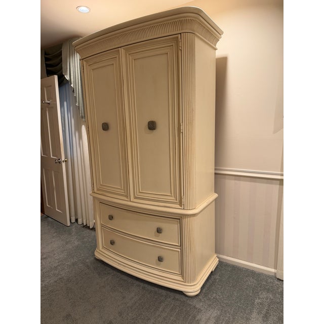 Beautiful antique white French Provincial style armoire, made in the USA by Stanley Furniture Company- a well-known...