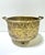 A beautiful, footed, embossed cachepot with handles. The detail is wonderful. Dimensions: 6.5" tall 11" wide (including...