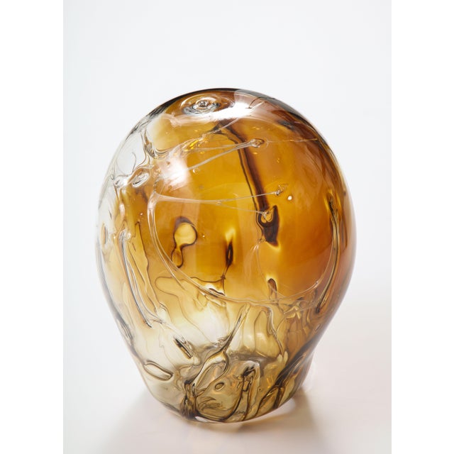 Extra large handblown glass sculpture by Peter Bramhall. Rare color combination in tones of amber and brown with internal...
