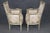 An exceptional pair of Louis XVI style paint-decorated bergère chairs by the celebrated Parisian design house Maison...