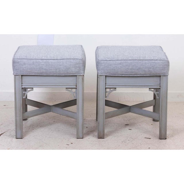 Pair Of Chinese Chippendale Benches with painted distressed finish and newly upholsered. Ready to use.