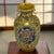 This vintage small vase is a beautiful piece of Asian-style decor that exudes elegance and charm. The hand-painted enamel...