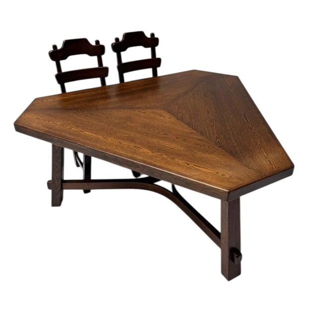 Magnificent and rare Brutalist dining room table with six Brutalist dining room chairs. Striking Dutch design from the...