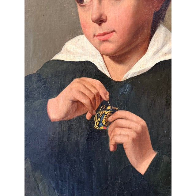 An exceptionally charming and unusual French School portrait dating to the late 18th or early 19th century, depicting a...