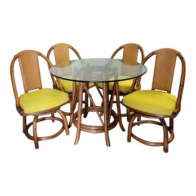 Organic Modern Rattan Dining Set With Four Swivel Chairs and Glass Top Table For Sale