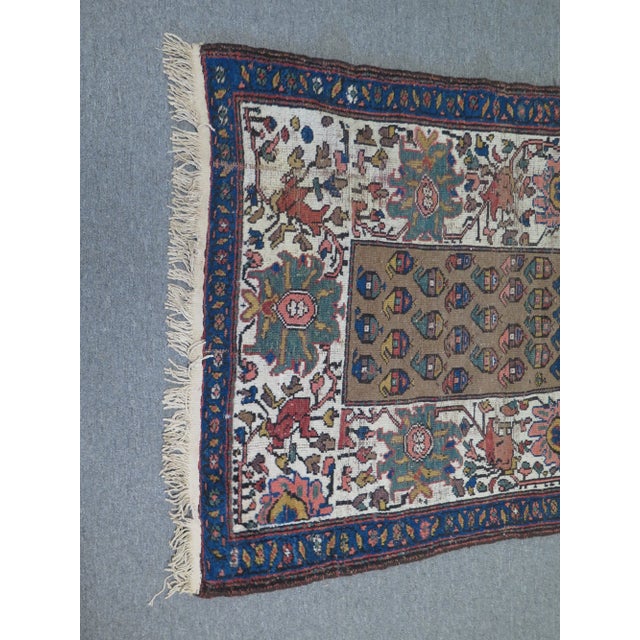 This is a vintage Persian Heriz rug. The piece is about 75 years old. High Quality Construction Grade 6 Out Of 10...