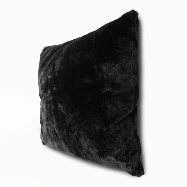 Black bear faux fur pillow. Super soft with plush insert.