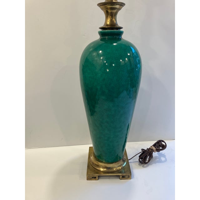 This pair of lamps has a malachite green crackle glaze The harps are included The closeup photos of the crackle glaze Have...