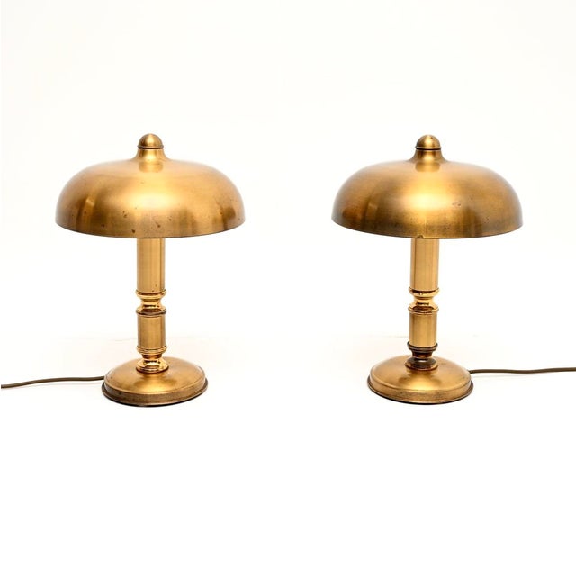 A very stylish pair of vintage brass mushroom table lamps, made in Germany and dating from around the 1960’s. They are of...