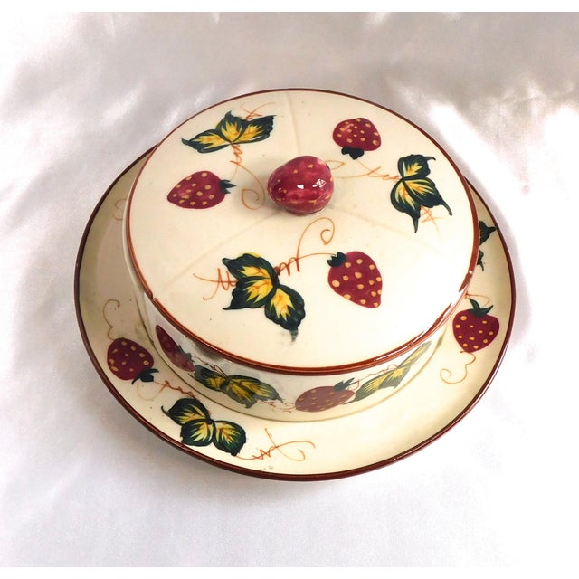 This is a six piece item. It is an underplate, a lid, three semi circular dishes and a spoon. Everything but the spoon is...