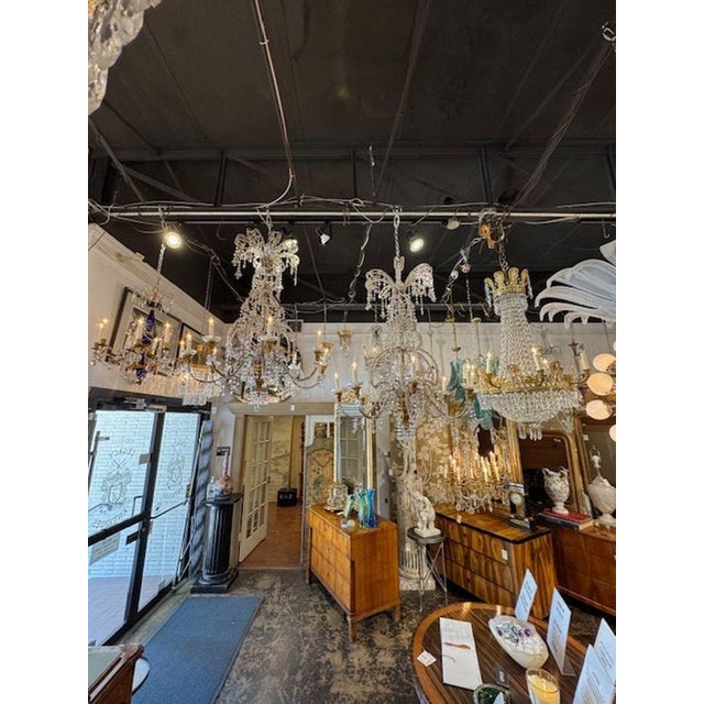 These are lovely of Italian 19th Century Giltwood chandeliers featuring crystals and beads. Designed in an Italian style,...