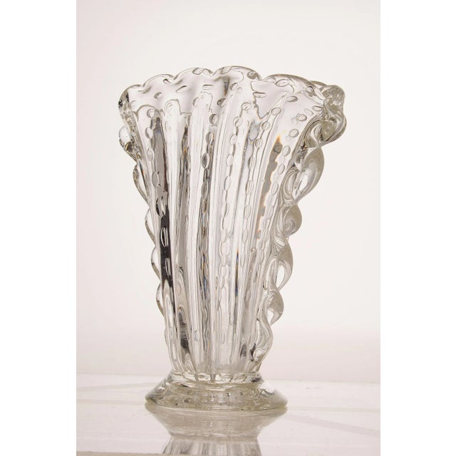 Oval-shaped Barovier & Toso vase, made of crystal glass with the particular "bullying" processing (Venetian jargon) used...