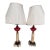 Re-worked from 19th Century oil lamps these cranberry, alabaster and marble lamps with their pleated silk shades work well...