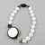 This elegant Angela Caputi, made in Italy, resin choker beaded necklace works with a black and white contrast. The...