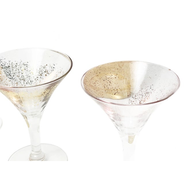 This glamorous mid century set features a cocktail pitcher and 5 accompanying martini glasses! They are made from blown...