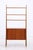 Vintage teak shelving unit with a delicate construction and a closed storage compartment at the bottom. Three open shelves...