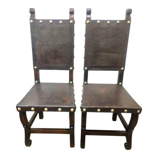 A striking set of six authentic Peruvian dining chairs showcasing traditional artisan craftsmanship and timeless Spanish...