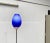 Elegant glass floor lamp by the Italian manufacturer Lucente. The striking glass diffuser is overlaid in matt blue and...