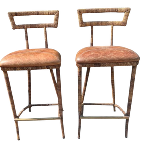 Elevate Your Home Bar or Kitchen Island With This Stunning Pair of Maitland-Smith Campaign-Style Bar Stools.