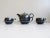 Handy tea service for two people. An extraordinary studio ceramic, probably from the mid century. Ehable design with...
