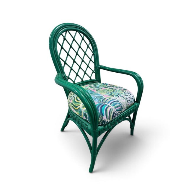 Cute Palm Beach set of green chairs and a side table. Tropical style fabric and nice weaving accent along the edges of the...