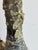 Antique champagne bottle with organic grown oyster shells on it.