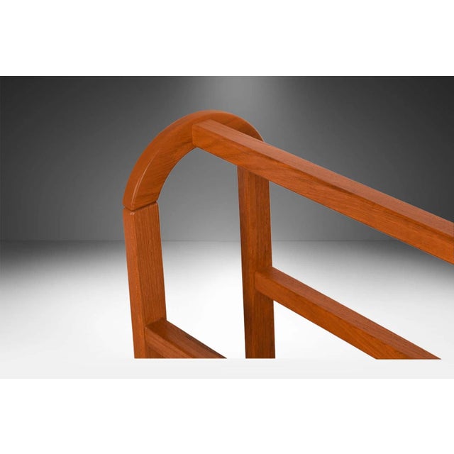 A rare beautiful, sleek Danish, teak blanket stand by FBJ Mobler made in Denmark. Features beautiful teak wood finely...