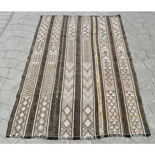Vintage Turkish Handmade Kilim Rug - A cotton on goat hair, Turkish Kilim rug that is in used condition. Size: 44" x 65.7"...