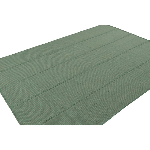 Handwoven in wool, a 8x11 Kilim in Teal and Seafoam accents, from a bold new line of contemporary flatweaves, ‘Rez Kilim’,...