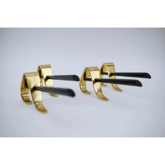Mid-Century Austrian Wall Hooks in Brass by Carl Auböck, 1950s, Set of 4, in Very Good conditions. Designed 1950 to 1959