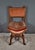 Rare curule chair in solid walnut in the Renaissance style, inspired by Roman and medieval seats, characterized by its...