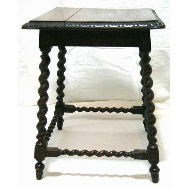 Lovely small table with petite barley twists on legs and stretchers. Original oak finish has not been altered. Has 1 long...